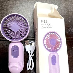 Small hand help mini fan.